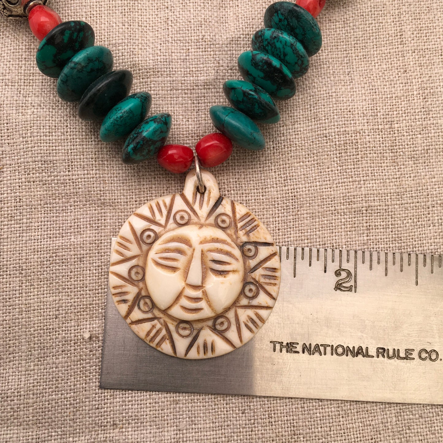 necklace “Sun Mask” Carved Bone Sun pendant, Turquoise, Red fire coral, Pewter beads, Hamsa toggle, reiki charged, Gender Neutral jewelry