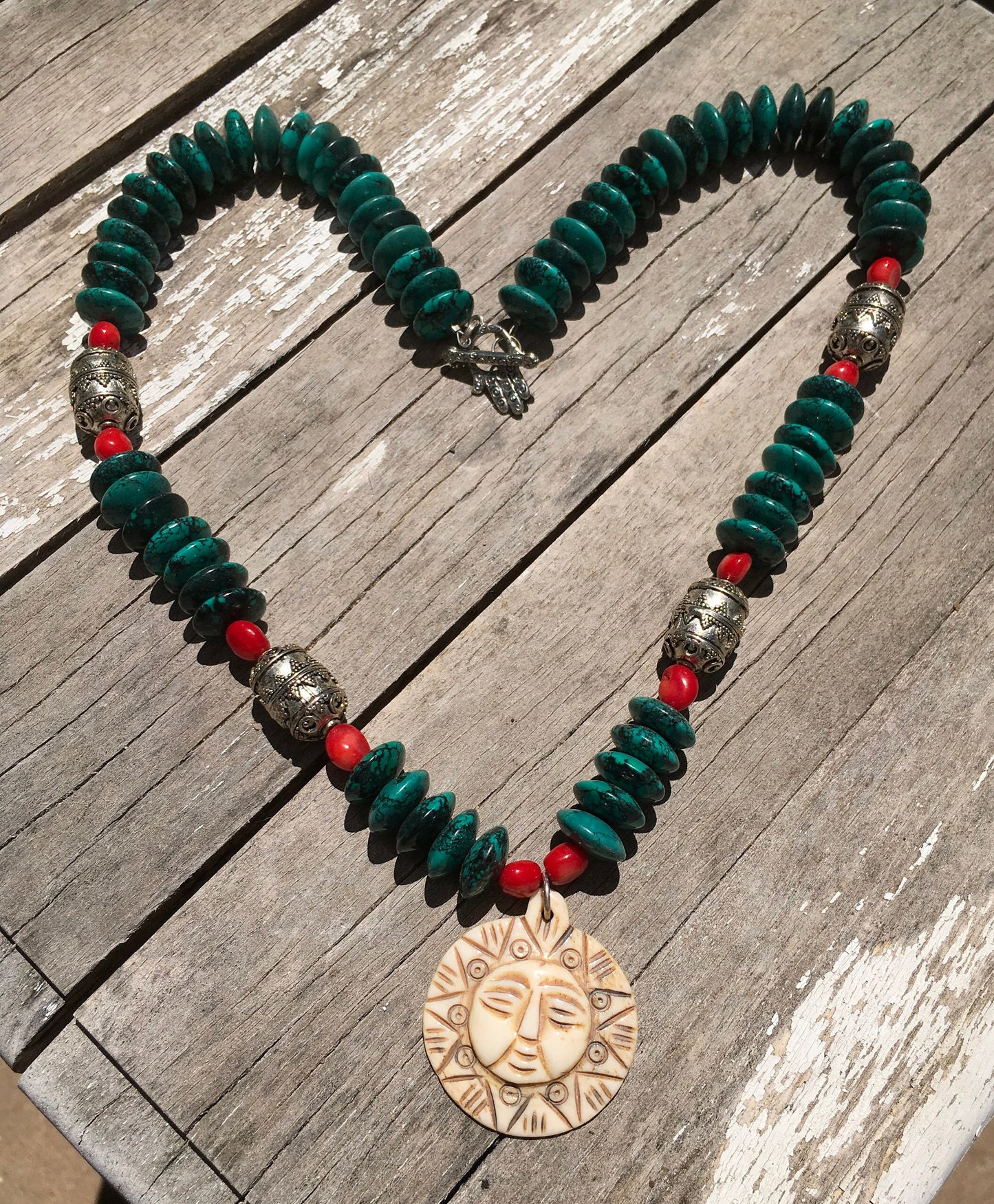 necklace “Sun Mask” Carved Bone Sun pendant, Turquoise, Red fire coral, Pewter beads, Hamsa toggle, reiki charged, Gender Neutral jewelry