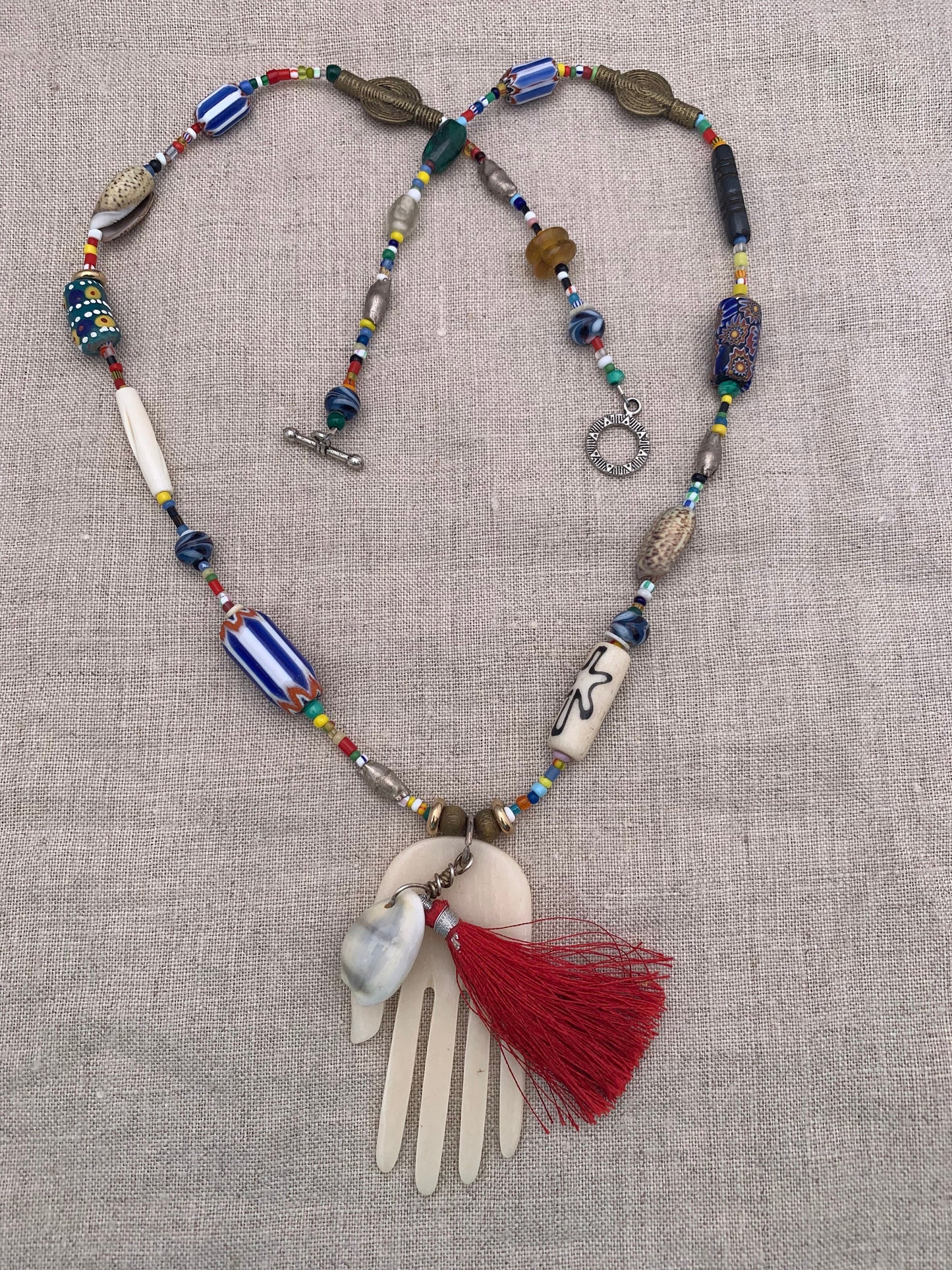 necklace "Her Magic Hand" Bone Hamsa with Shell & Tassel pendant, African Trade Beads, Krobo beads, Shells, Bohemian jewelry, Reiki charged