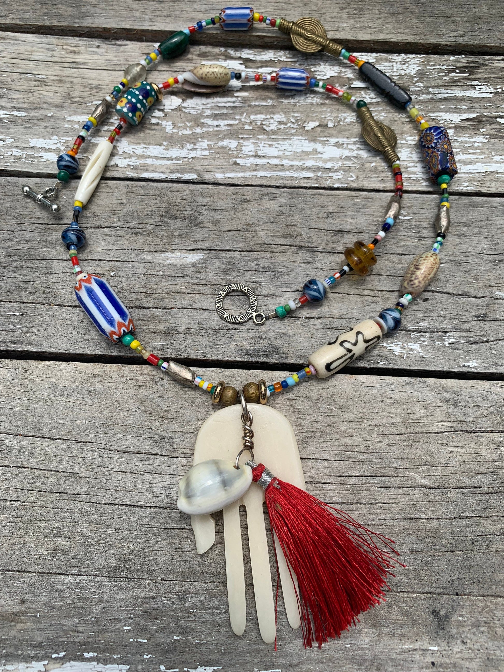 necklace "Her Magic Hand" Bone Hamsa with Shell & Tassel pendant, African Trade Beads, Krobo beads, Shells, Bohemian jewelry, Reiki charged