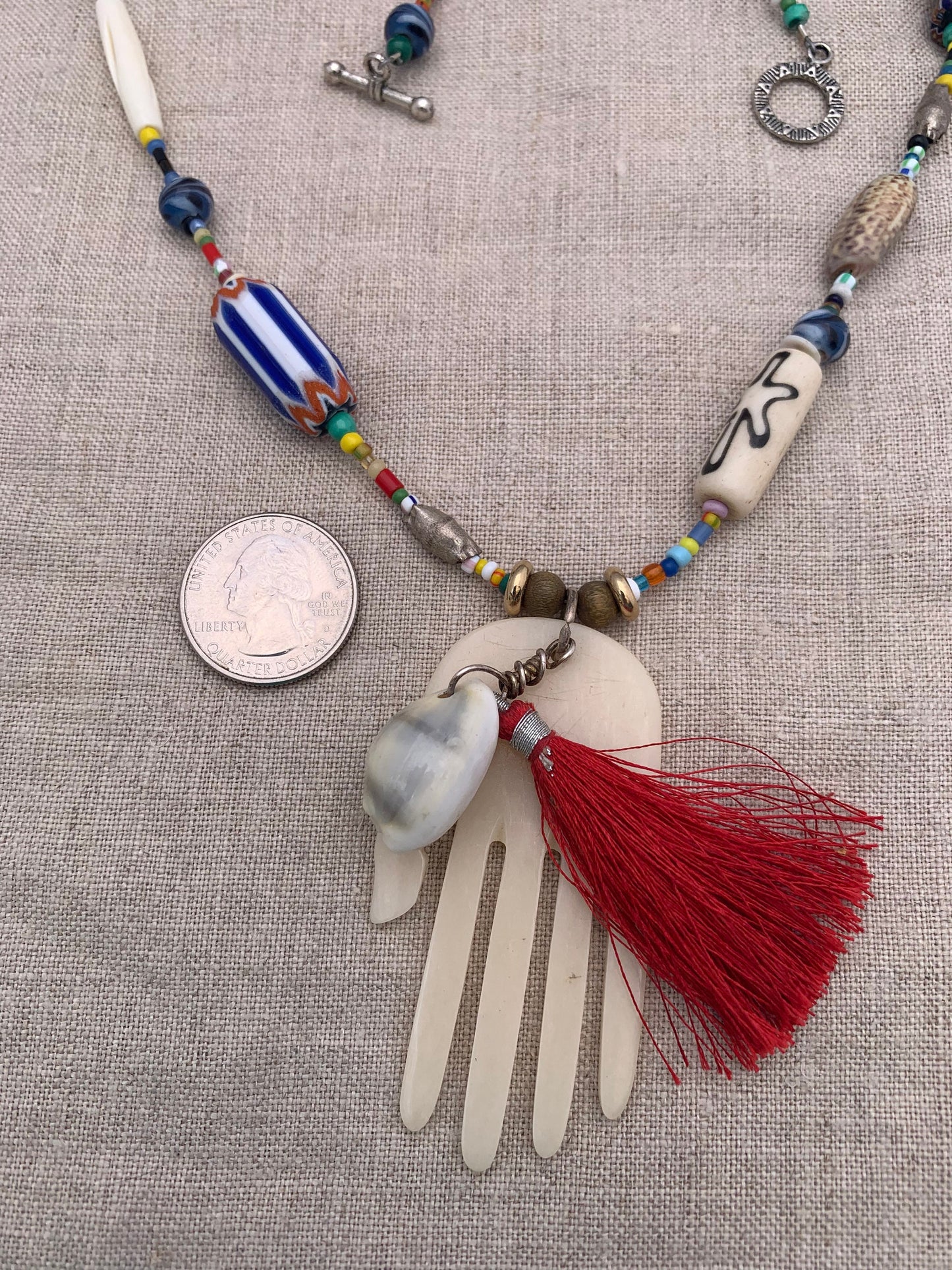 necklace "Her Magic Hand" Bone Hamsa with Shell & Tassel pendant, African Trade Beads, Krobo beads, Shells, Bohemian jewelry, Reiki charged