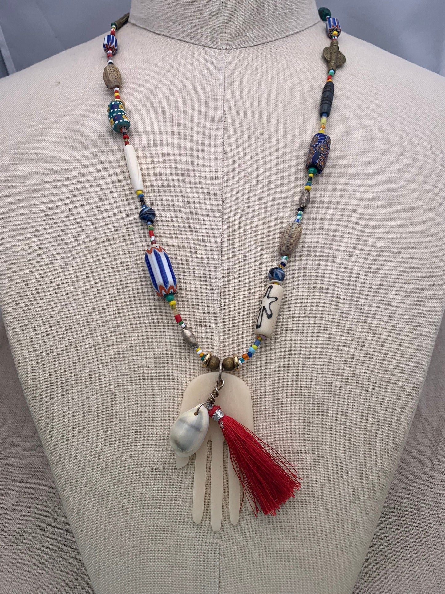 necklace "Her Magic Hand" Bone Hamsa with Shell & Tassel pendant, African Trade Beads, Krobo beads, Shells, Bohemian jewelry, Reiki charged